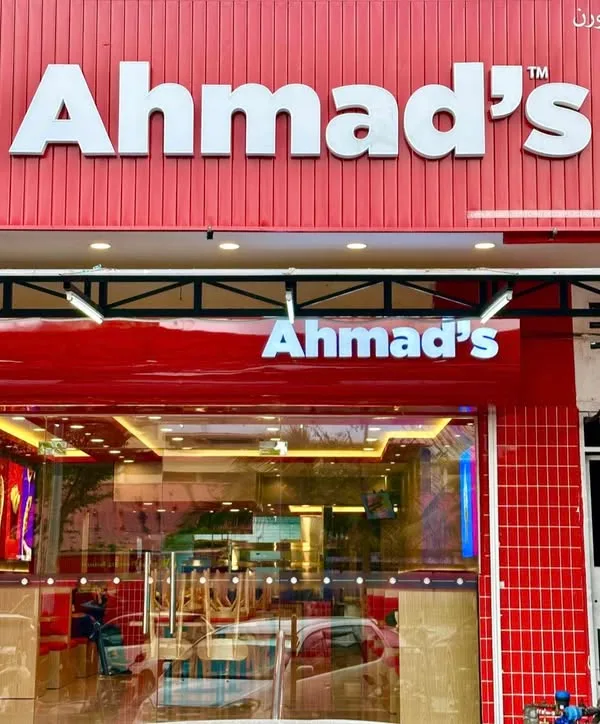The red storefront of Ahmad’s Taman Kosas outlet